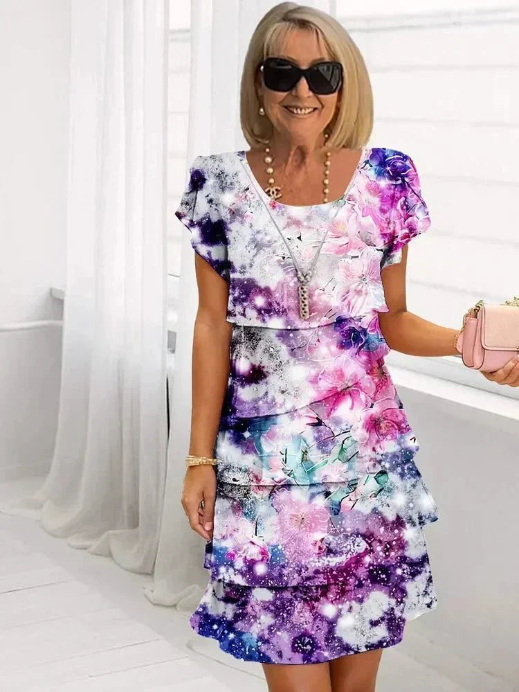 Jenna cascading floral tiered dress with flowing skirt in a soft feminine print