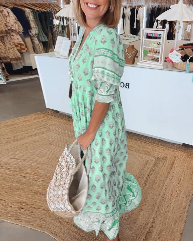 Mana floral v-neck dress shown in blue, green and pink