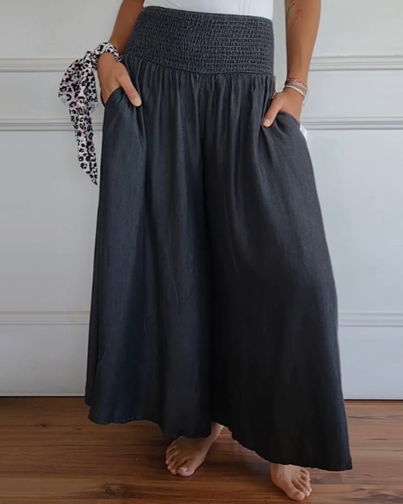 Sage flowy high-waist wide-leg pants shown in a relaxed, flattering silhouette