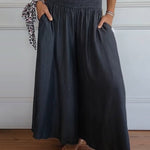 Sage flowy high-waist wide-leg pants shown in a relaxed, flattering silhouette