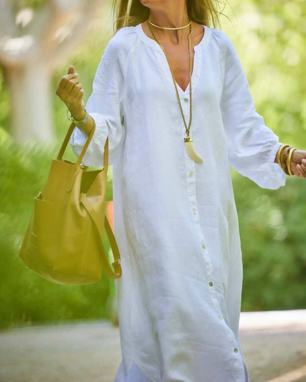 Elaina relaxed maxi dress with buttons and flowing skirt, shown in white