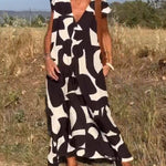 Amelia printed V-neck A-line dress in a flowing silhouette