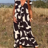 Amelia printed V-neck A-line dress in a flowing silhouette