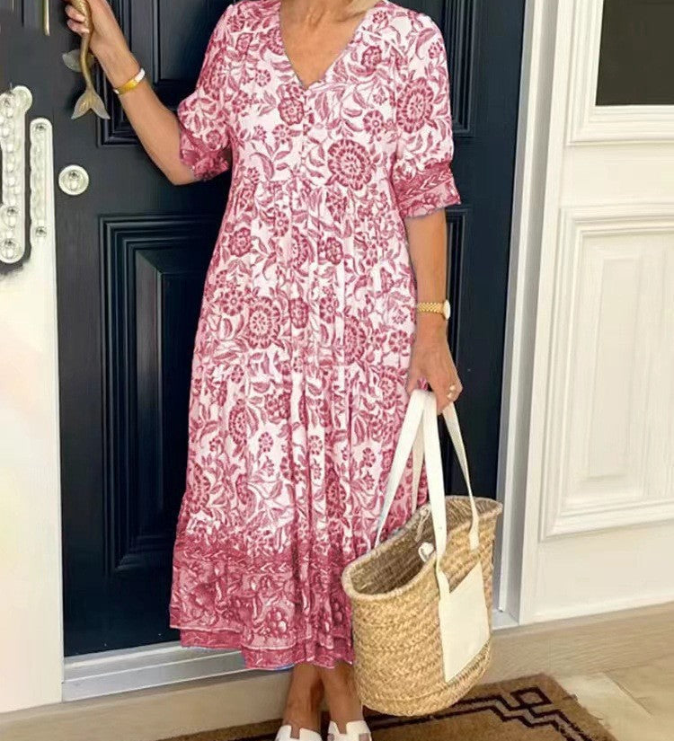 Keisha graceful V-neck floral dress shown in a soft feminine silhouette