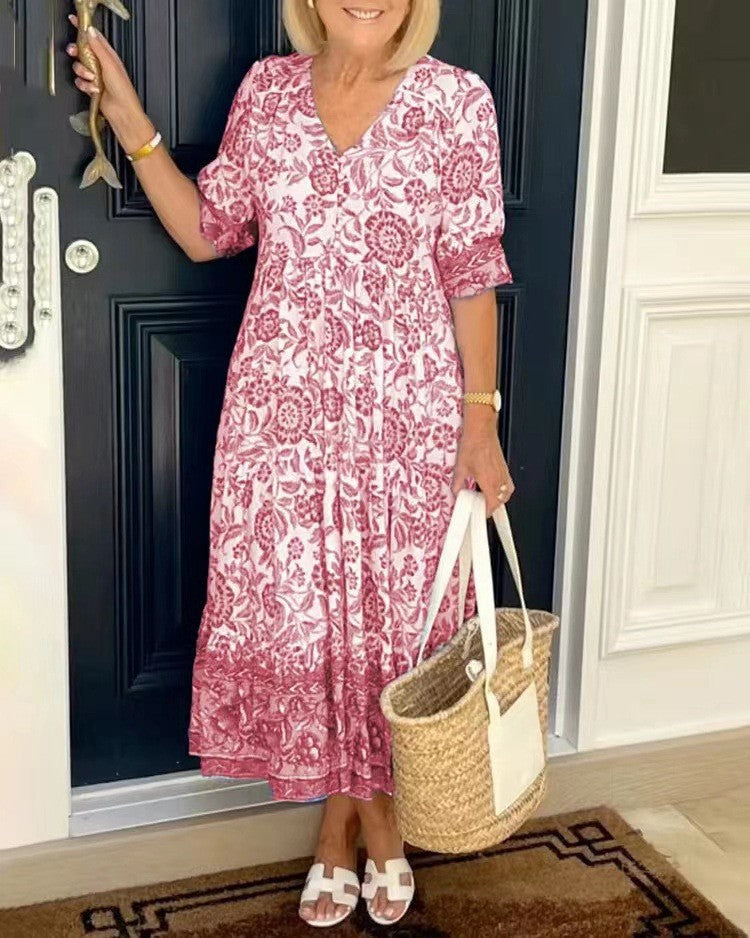 Keisha graceful V-neck floral dress shown in a soft feminine silhouette