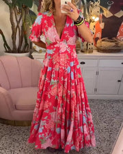Izara flowy maxi dress with softly cinched elastic waist, shown in a relaxed feminine silhouette