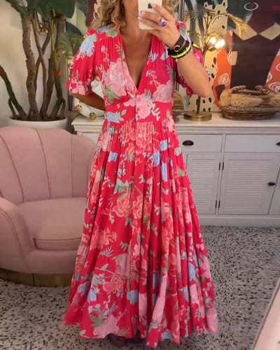 Izara flowy maxi dress with softly cinched elastic waist, shown in a relaxed feminine silhouette