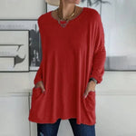 Alondra everyday pocket top with loose fit and flared hem, shown in a neutral colour