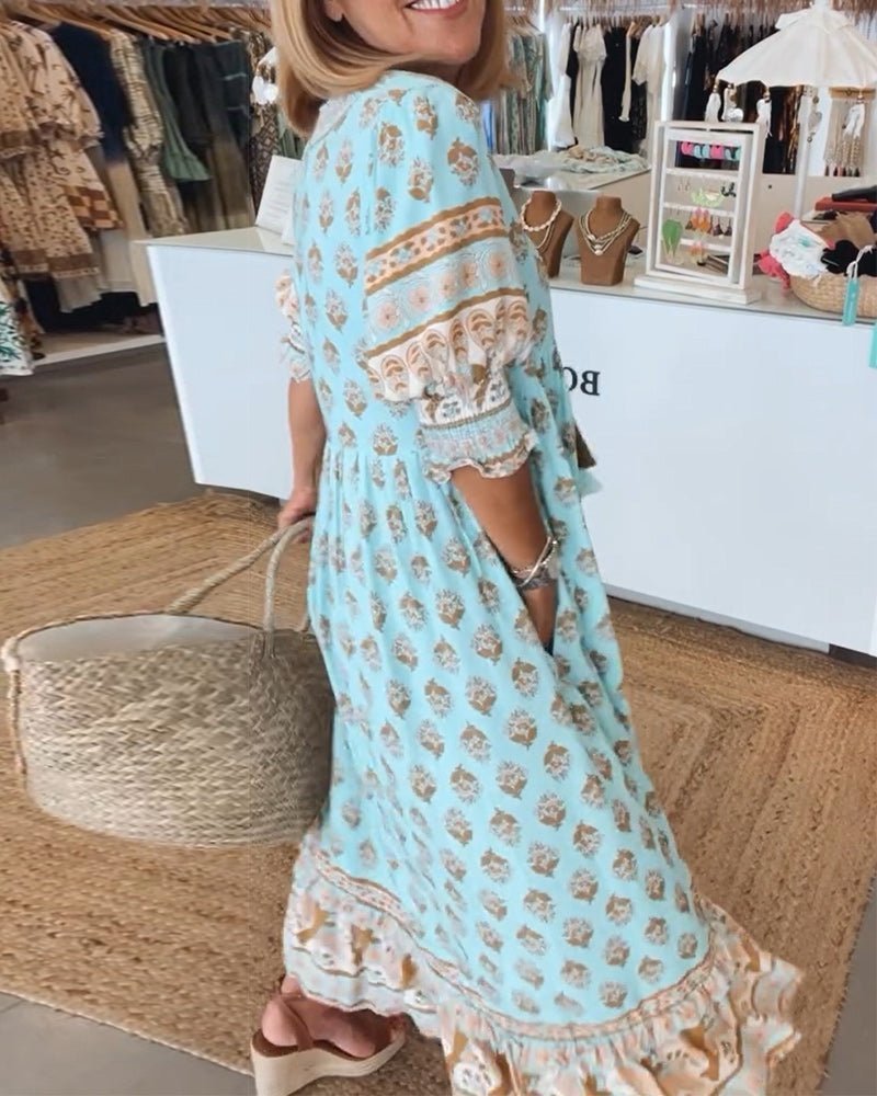 Mana floral v-neck dress shown in blue, green and pink
