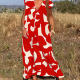 Amelia printed V-neck A-line dress in a flowing silhouette