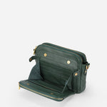 Kaya's Jewel full-grain leather shoulder bag shown in brown, blue, black and green