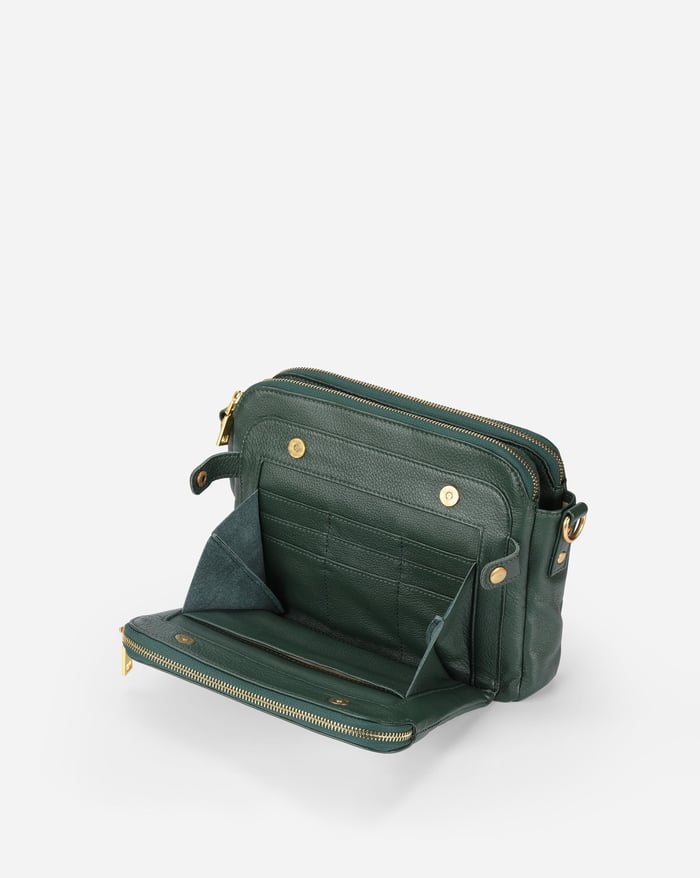 Kaya's Jewel full-grain leather shoulder bag shown in brown, blue, black and green