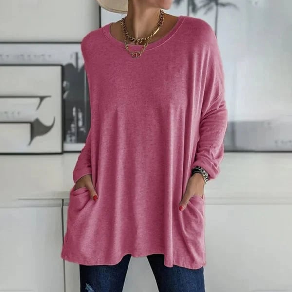 Alondra everyday pocket top with loose fit and flared hem, shown in a neutral colour