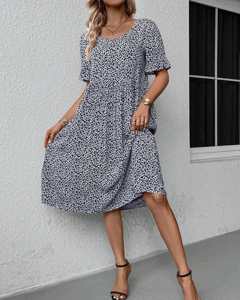 Anne elegant bloom midi dress in blue, red and green with a flattering feminine silhouette