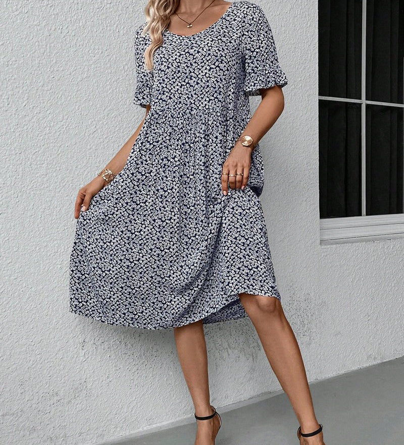 Anne elegant bloom midi dress in blue, red and green with a flattering feminine silhouette