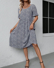 Anne elegant bloom midi dress in blue, red and green with a flattering feminine silhouette