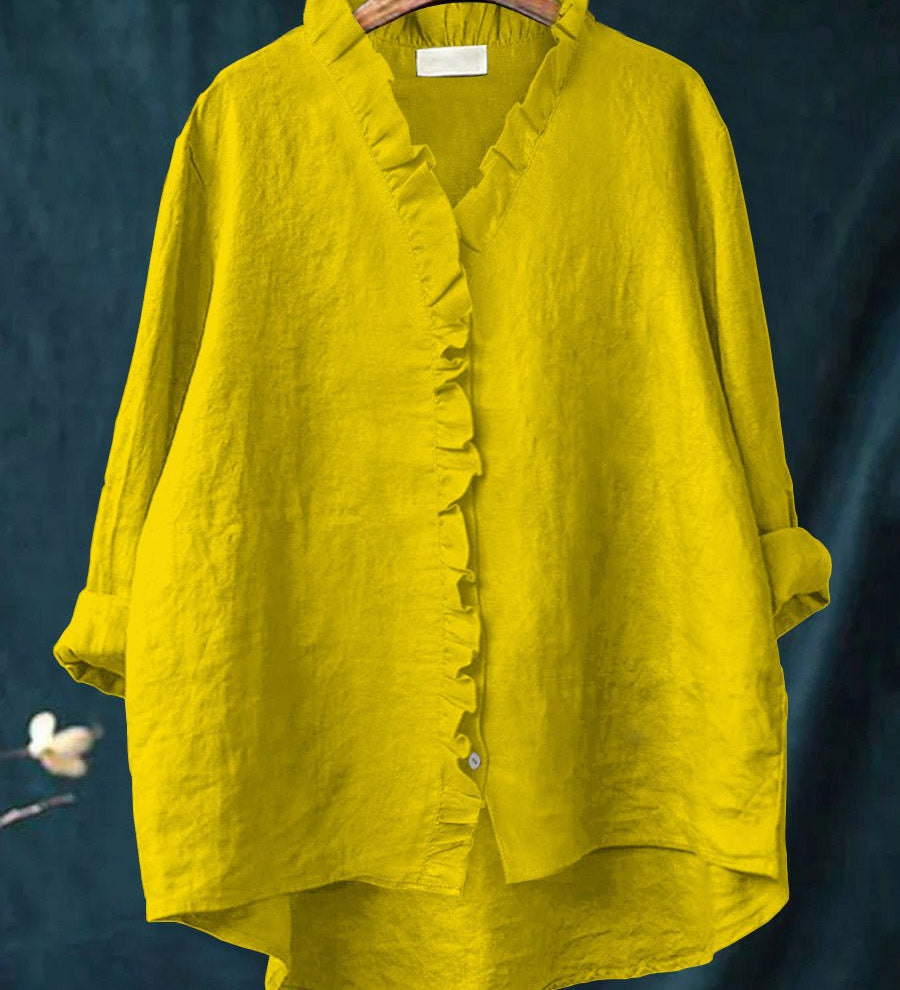 Rica retro ruffle blouse with collar and front placket ruffle detailing and long sleeves
