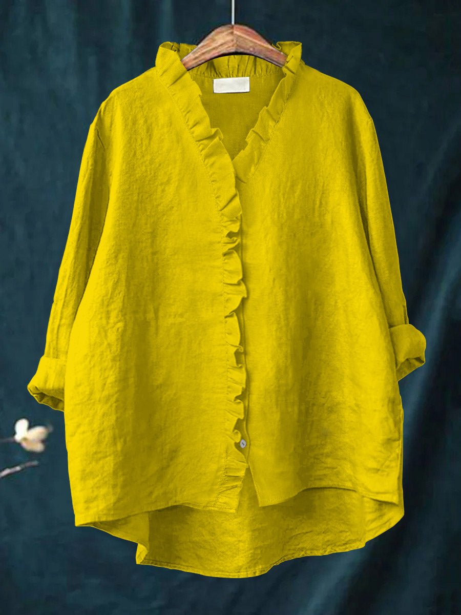 Rica retro ruffle blouse with collar and front placket ruffle detailing and long sleeves