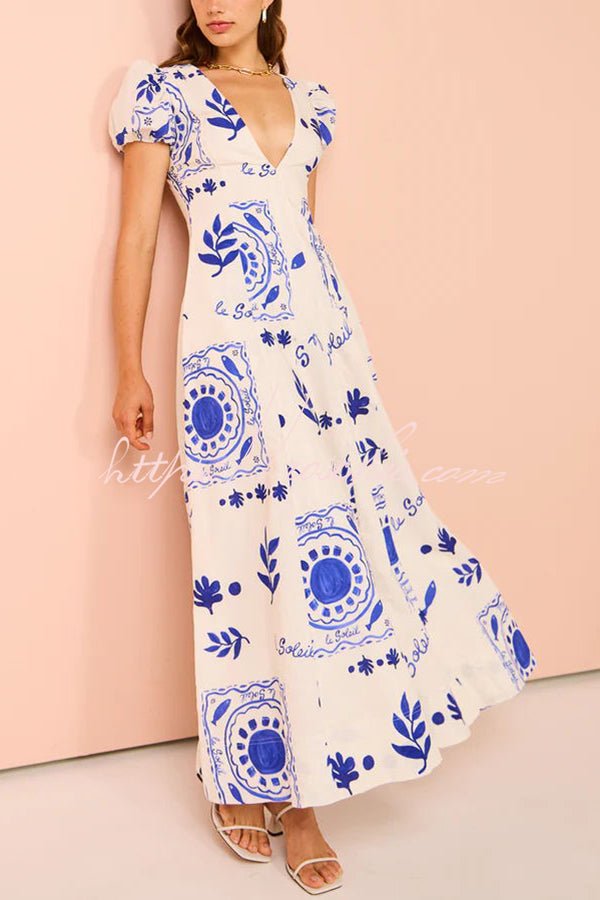 Avermy blue floral maxi dress with V-neckline and puff sleeves