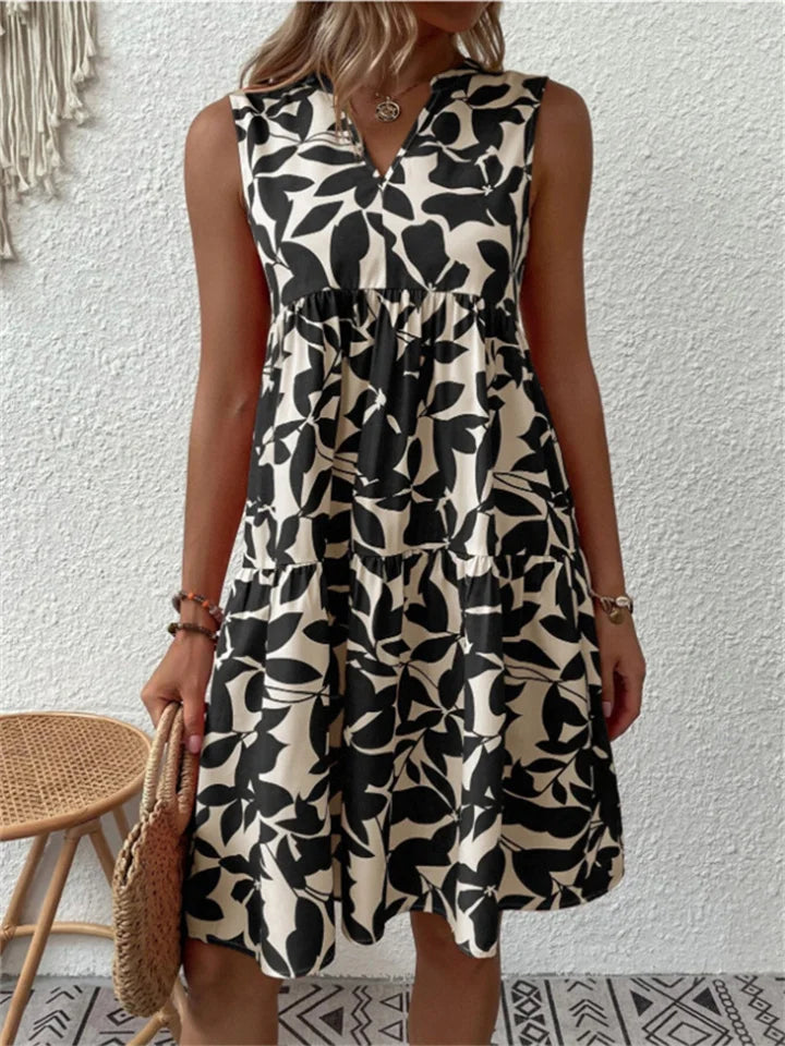 Tasha blooming floral flowy A-line summer dress in green, blue, orange and black
