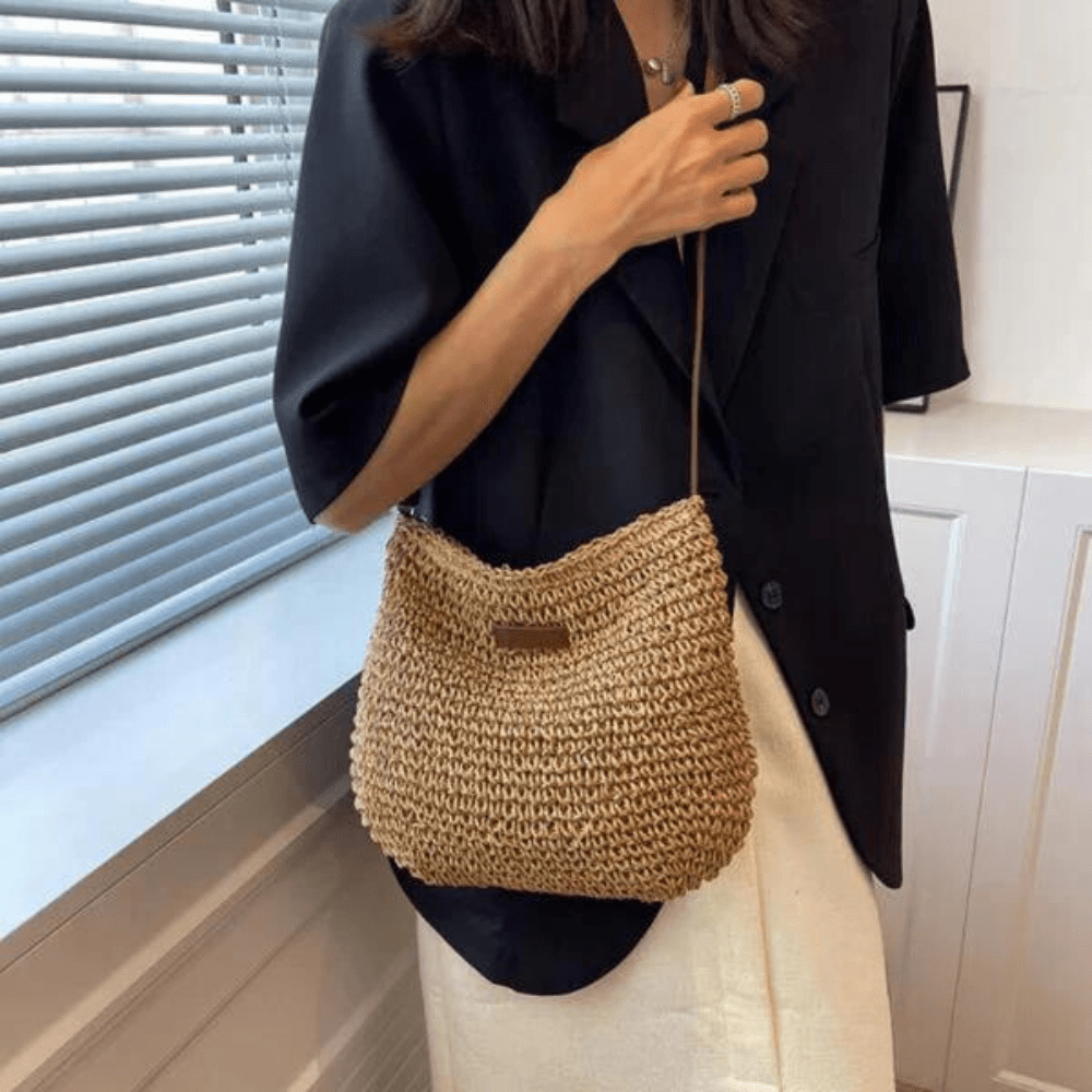 Coralyn woven crossbody bag with adjustable strap in brown