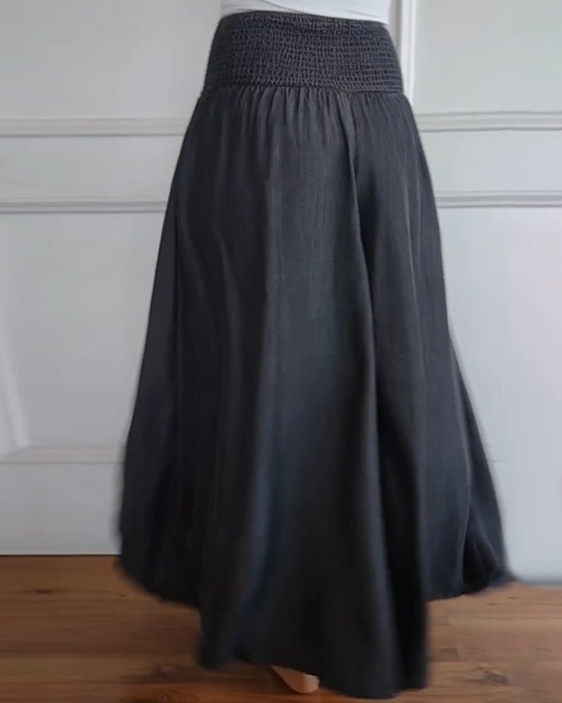 Sage flowy high-waist wide-leg pants shown in a relaxed, flattering silhouette
