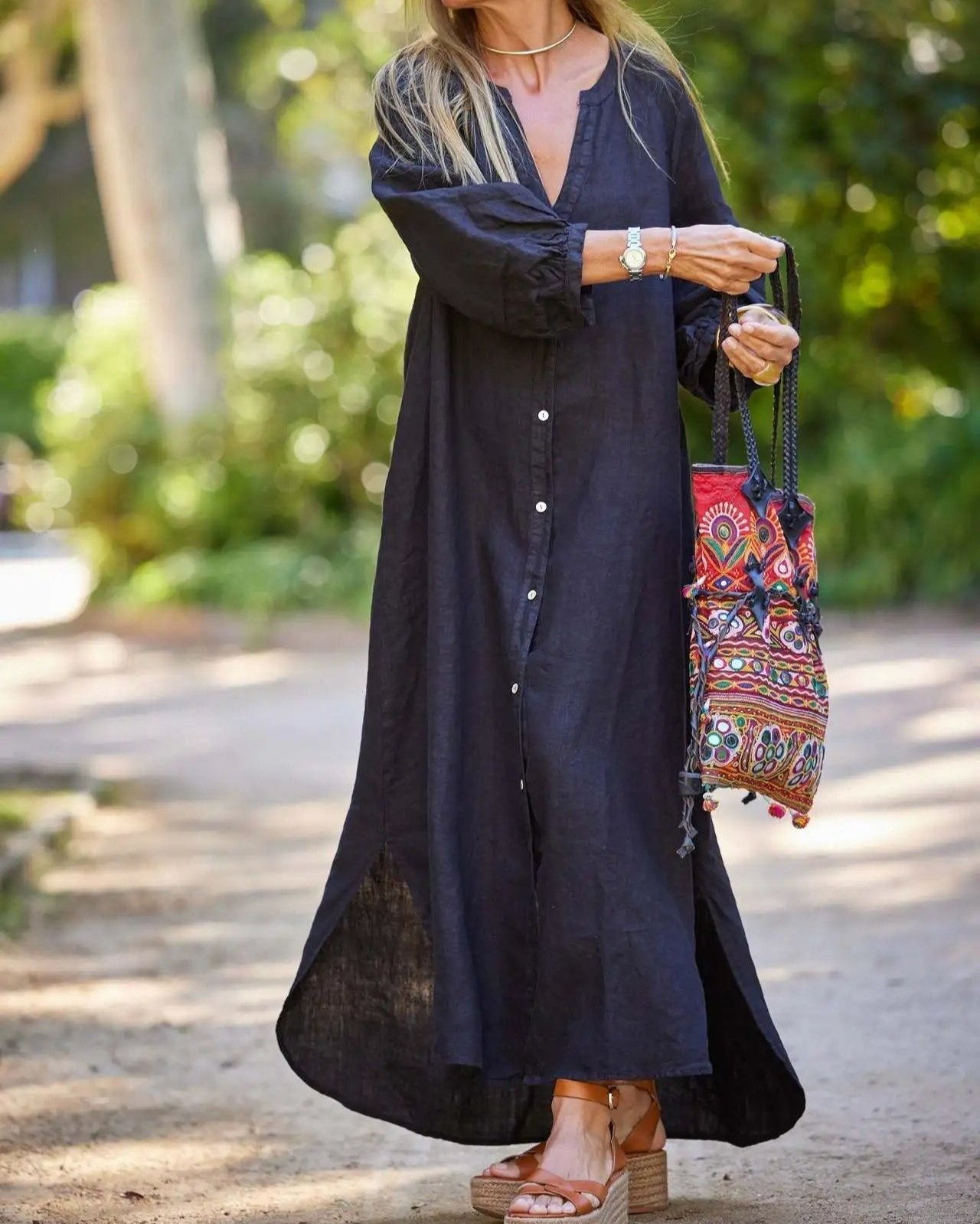 Elaina relaxed maxi dress with buttons and flowing skirt, shown in white