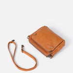 Kaya's Jewel full-grain leather shoulder bag shown in brown, blue, black and green