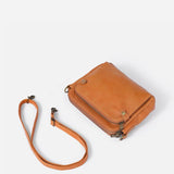 Kaya's Jewel full-grain leather shoulder bag shown in brown, blue, black and green