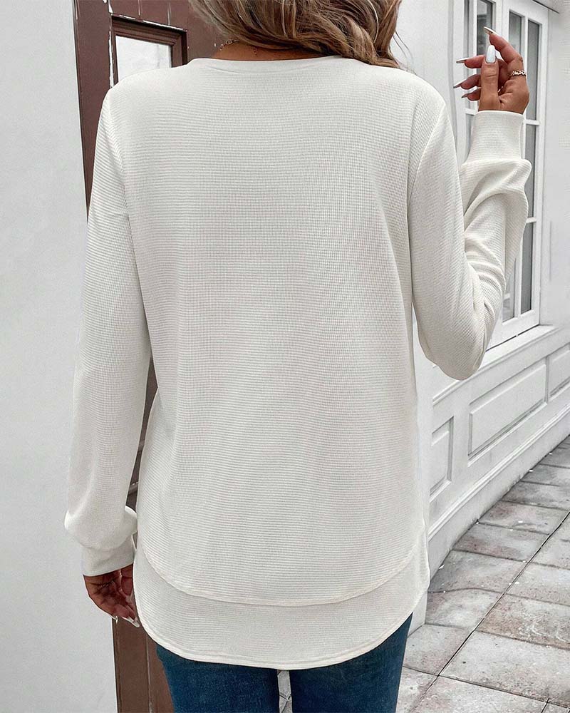 Ynes graceful long sleeve top with a classic round neck and regular fit