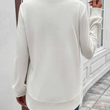 Ynes graceful long sleeve top with a classic round neck and regular fit