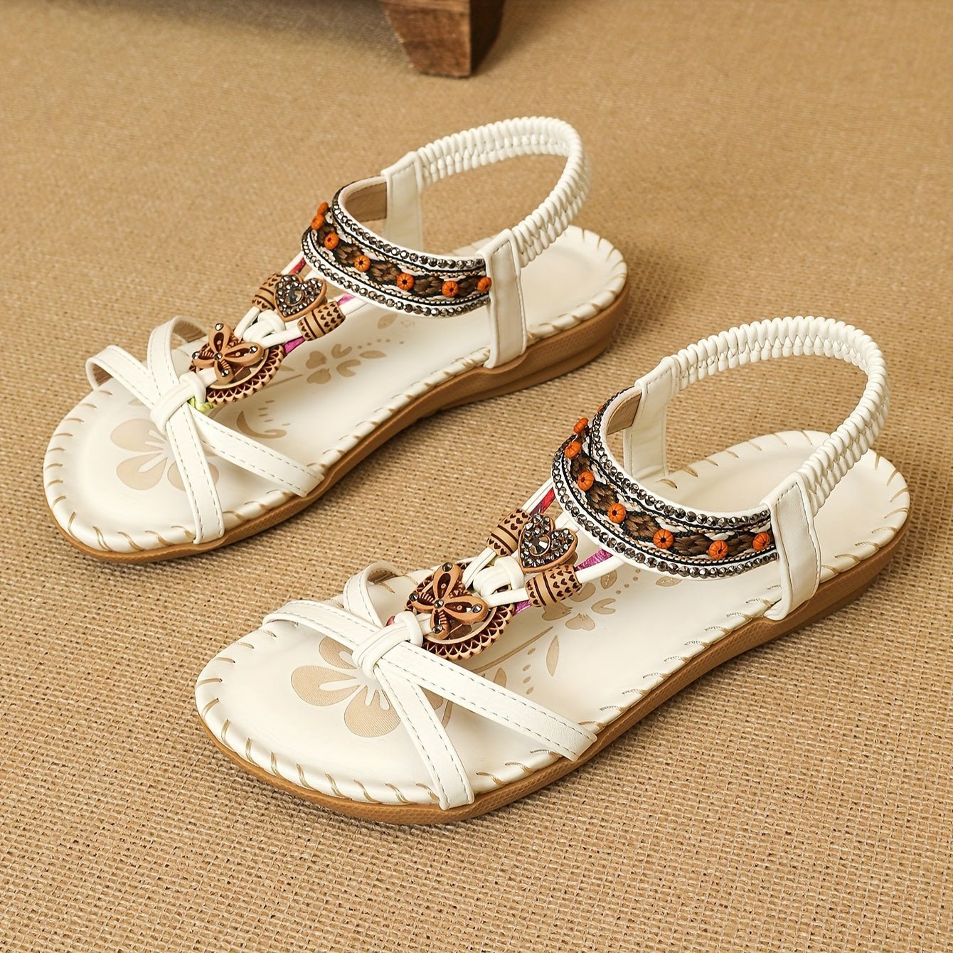 Nalu boho flat sandals with beaded, tribal-inspired detailing in a neutral earthy tone