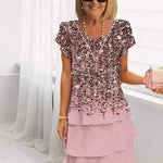 Jenna cascading floral tiered dress with flowing skirt in a soft feminine print