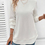 Ynes graceful long sleeve top with a classic round neck and regular fit