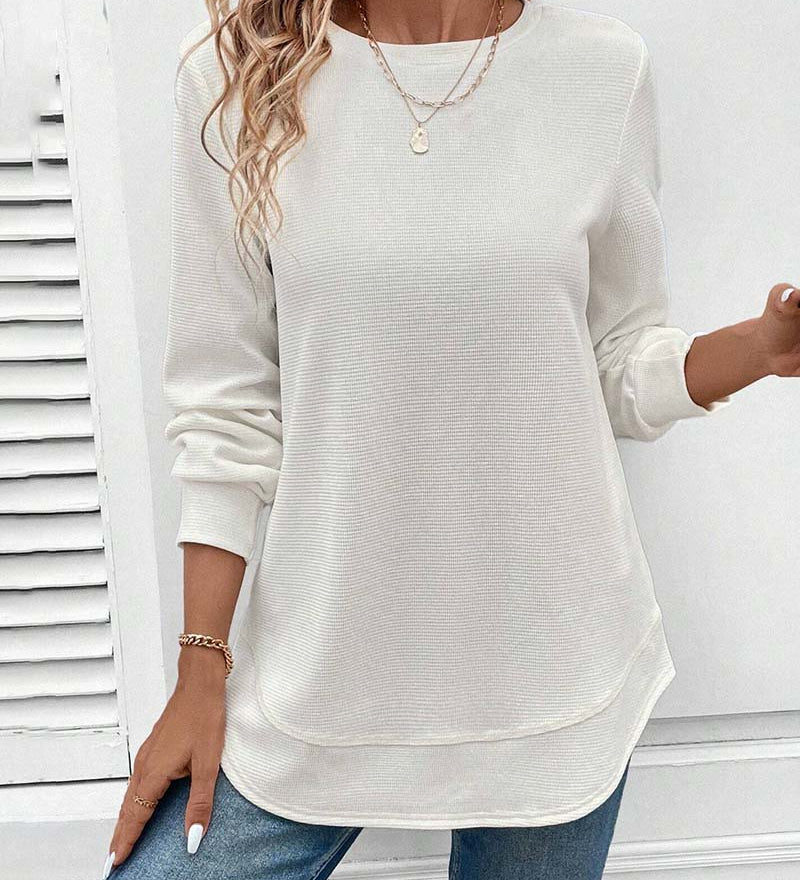 Ynes graceful long sleeve top with a classic round neck and regular fit