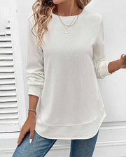 Ynes graceful long sleeve top with a classic round neck and regular fit
