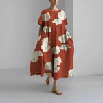 Celia floral Garden Goddess dress in a feminine print, shown in multiple colourways