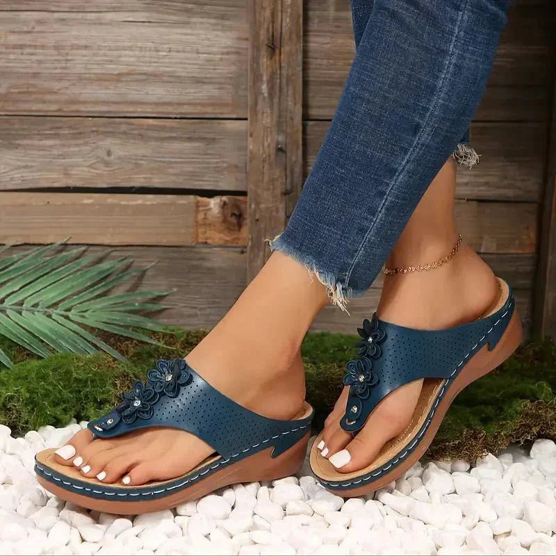 Nami orthopedic wedge sandals shown in white, blue, gold and black