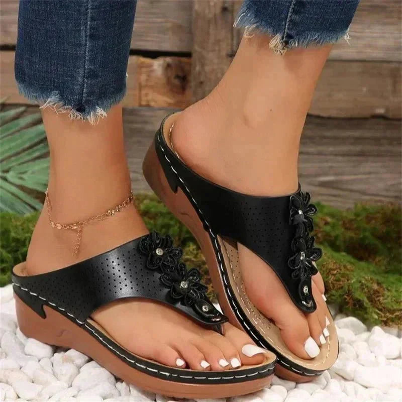 Nami orthopedic wedge sandals shown in white, blue, gold and black