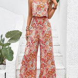 Nympha apricot floral wide-leg jumpsuit with backless design