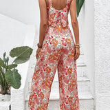 Nympha apricot floral wide-leg jumpsuit with backless design