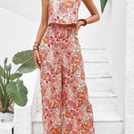 Nympha apricot floral wide-leg jumpsuit with backless design