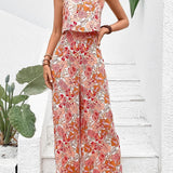 Nympha apricot floral wide-leg jumpsuit with backless design
