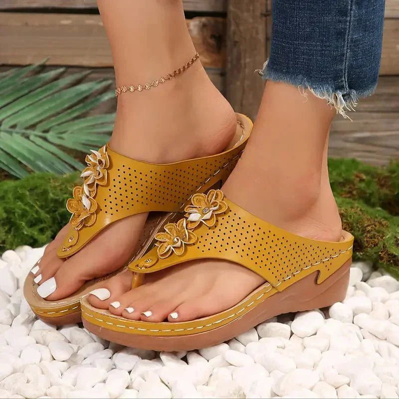 Nami orthopedic wedge sandals shown in white, blue, gold and black