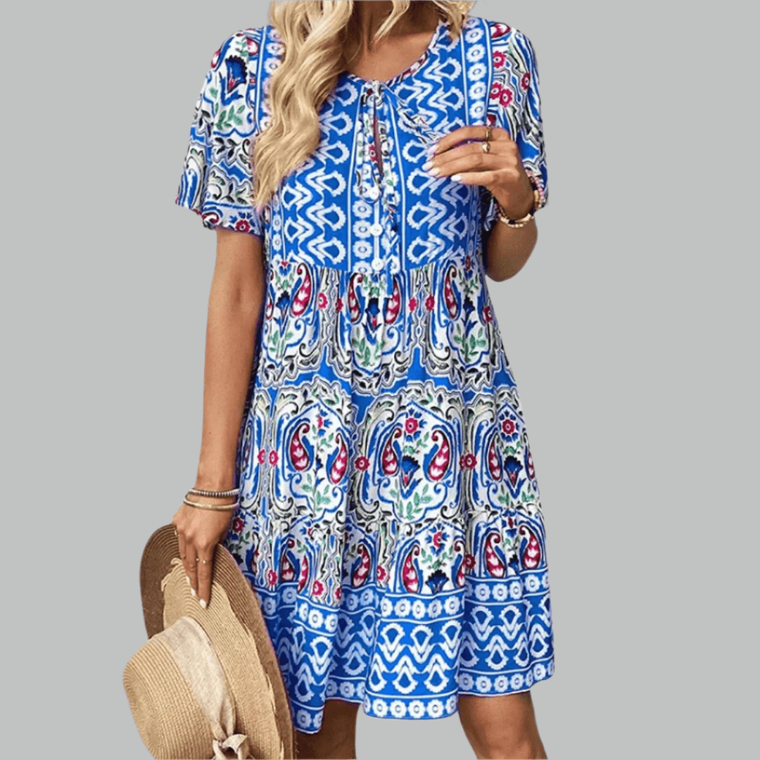 Abigail graceful midi dress shown in orange, available in pink and blue