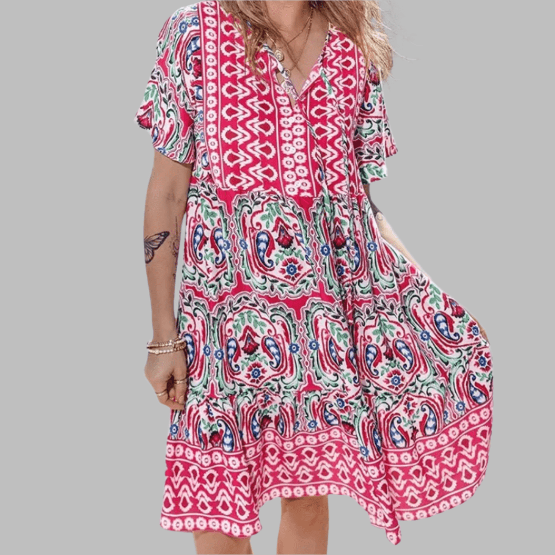 Abigail graceful midi dress shown in orange, available in pink and blue
