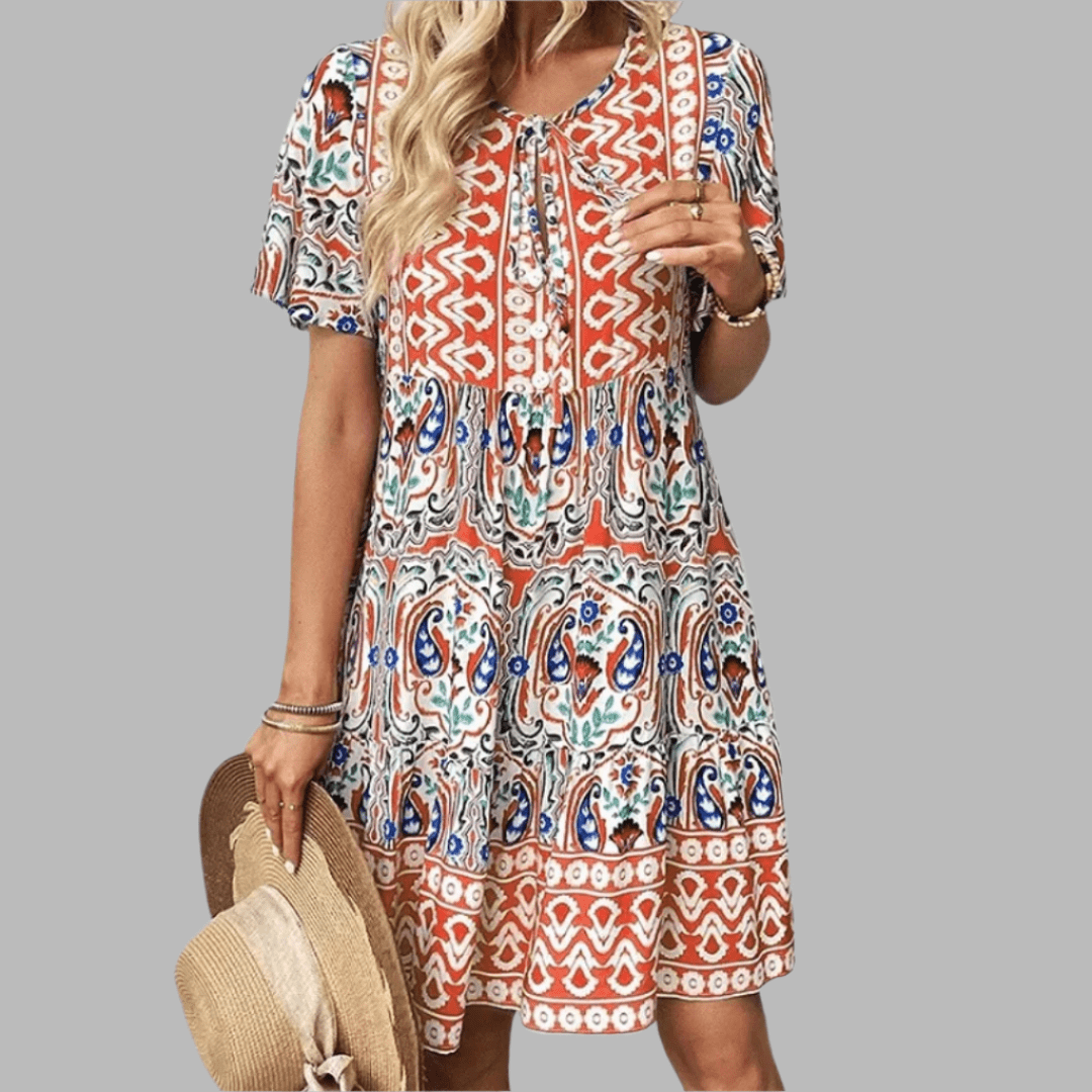 Abigail graceful midi dress shown in orange, available in pink and blue