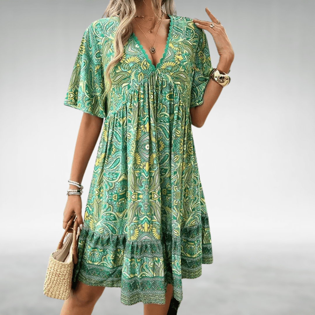 Bennett boho swing dress with v-neckline, empire waist and vibrant print