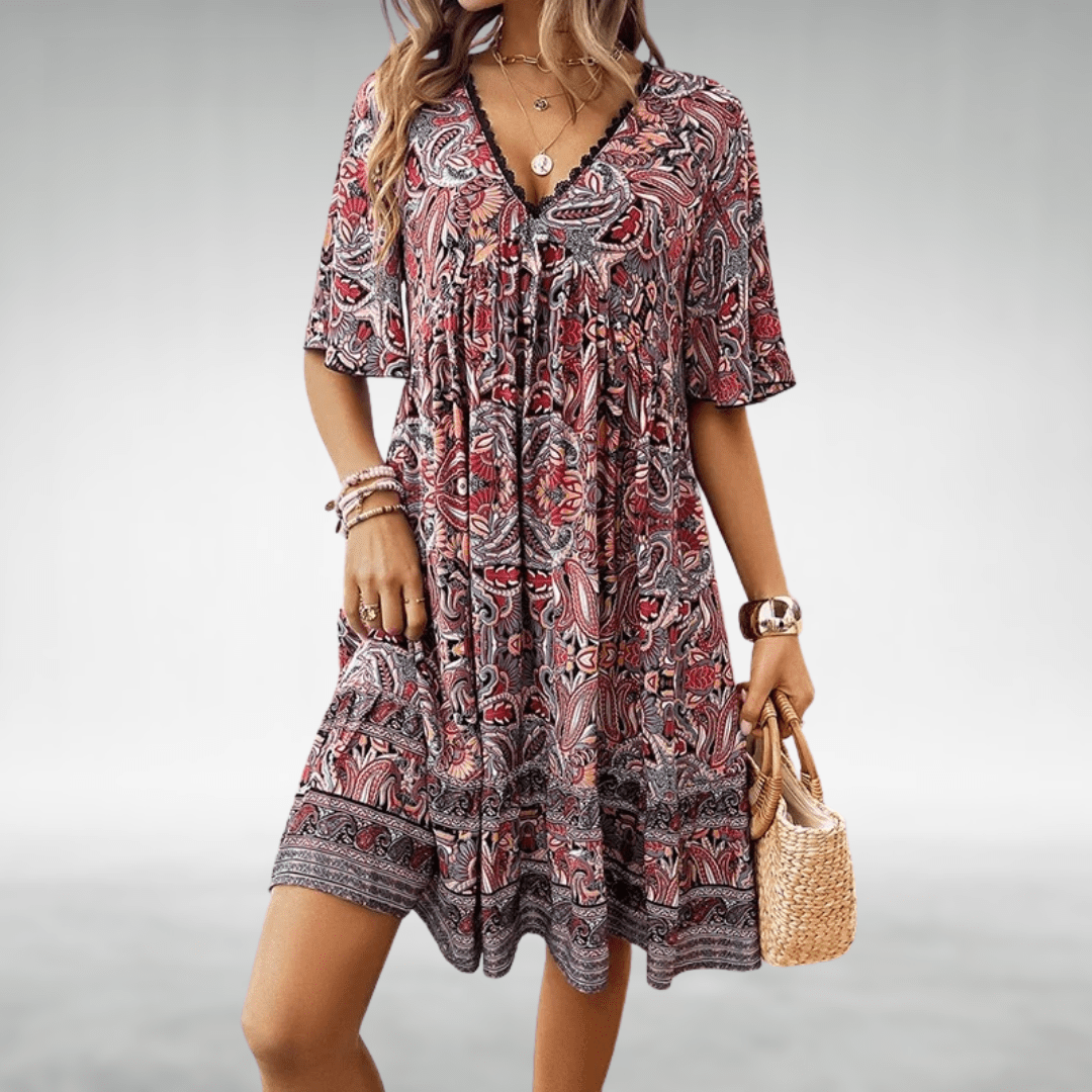 Bennett boho swing dress with v-neckline, empire waist and vibrant print