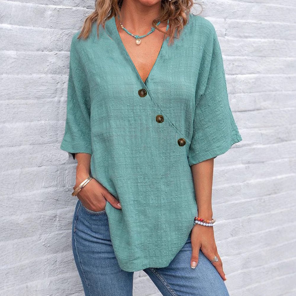 Kiray graceful polished blouse with V-neck and asymmetric button placket in a relaxed fit